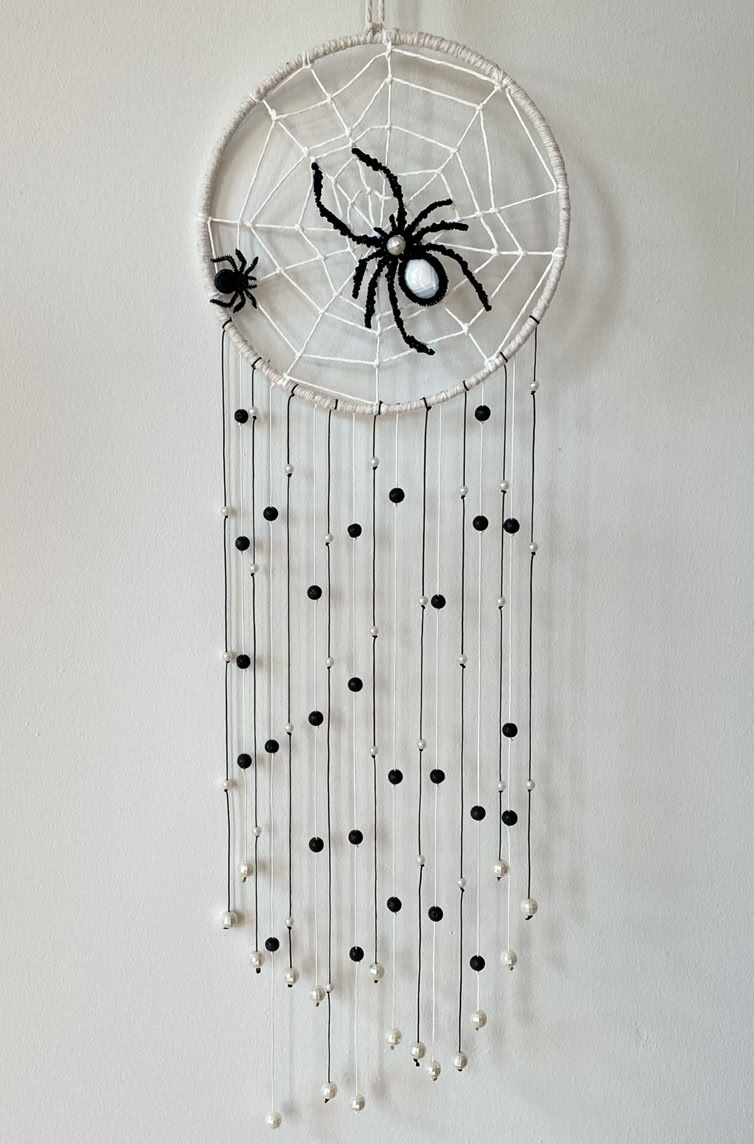 Beautiful macrame golden bead spider dreamcatcher with long flowing black & pearl beaded tail